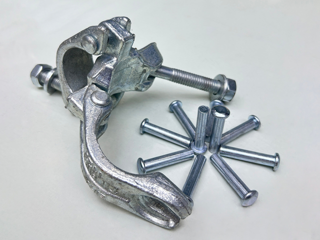 Double coupler base rivet